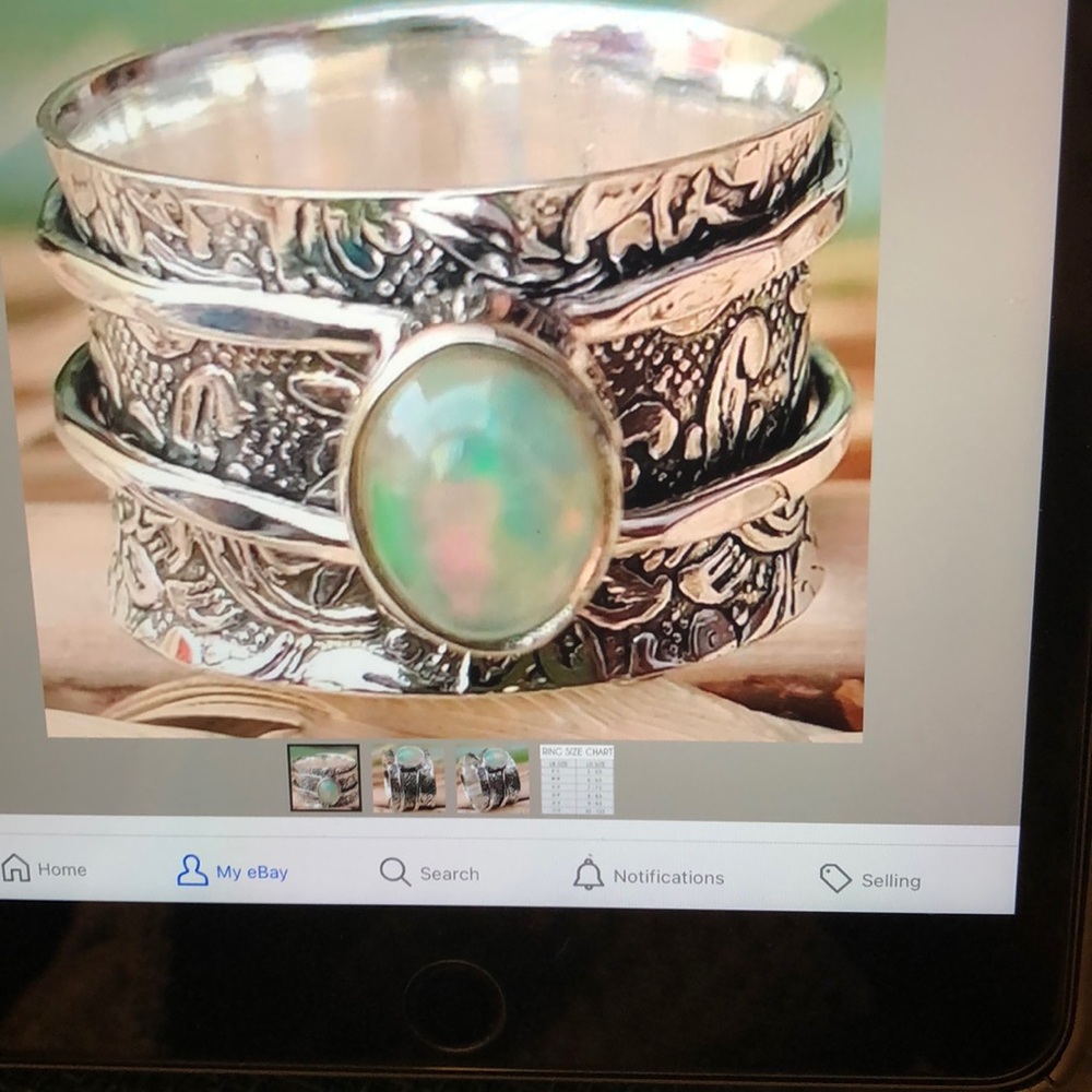 Sterling Silver Spinner Ring with Opal Center